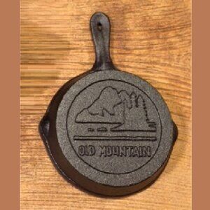 One (1) Old Mountain Cast Iron Spoon Rest Mini-Skillet 4 1/2" wide One (1) 10137